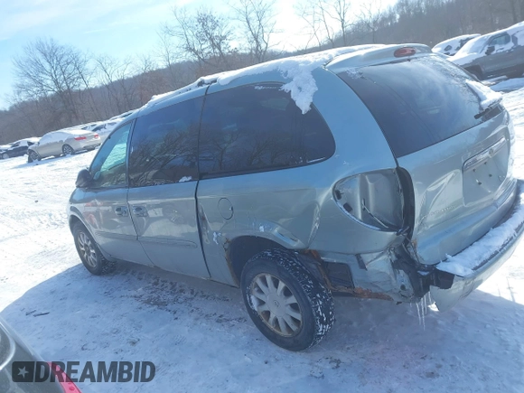 2003 Chrysler Town & Country LX with VIN 2C4GP44L43R224016, listed as a IAAI auction lot 41370108 with 122,418 mi miles and . Bid and sale history available at DreamBid. Image 14.