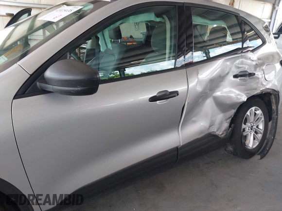 2020 Ford Escape S z VIN 1FMCU0F64LUC03656, wystawiony jako IAAI lot #42415638 z przebiegiem 96 759 mil mil oraz . Historia ofert i sprzedaży dostępna na DreamBid. Obrazek 6.