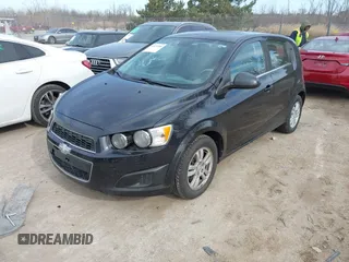 2013 Chevrolet Sonic LT with VIN 1G1JC6SH1D4191825, listed as a IAAI auction lot 41973380 with 172,504 mi miles. Bid and sale history available at carsss.com. Image 2.