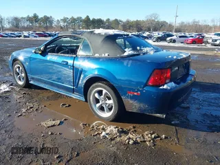 2000 Ford Mustang with VIN 1FAFP4449YF255044, listed as a IAAI auction lot 41534325 with 116,614 mi miles. Bid and sale history available at carsss.com. Image 3.