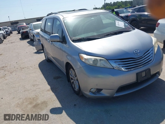 2012 Toyota Sienna XLE AAS with VIN 5TDYK3DC7CS185555, listed as a IAAI auction lot 42013098 with 140,969 mi miles. Bid and sale history available at carsss.com. Image 1.