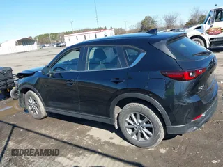 2023 Mazda CX-5 2.5 S with VIN JM3KFBAM9P0194078, listed as a IAAI auction lot 41579370 with 39,260 mi miles. Bid and sale history available at carsss.com. Image 15.