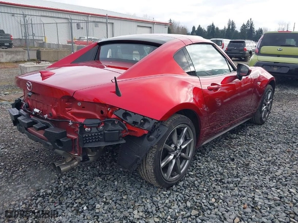 2023 Mazda MX-5 Miata RF Grand Touring with VIN JM1NDAM79P0559757, listed as a IAAI auction lot 41483924 with 5,512 mi miles. Bid and sale history available at carsss.com. Image 4.