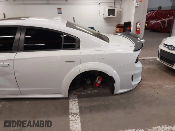 2021 Dodge Charger Scat Pack with VIN 2C3CDXGJ6MH563553, listed as a IAAI auction lot 41745898 with 39,844 mi miles and . Bid and sale history available at DreamBid. Image 6.