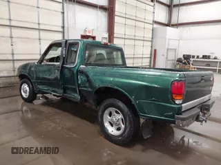 1999 Mazda B-Series Truck SE z VIN 4F4YR16C0XTM43278, wystawiony jako IAAI lot #41687429 z przebiegiem 288 858 mil mil oraz . Historia ofert i sprzedaży dostępna na DreamBid. Obrazek 3.