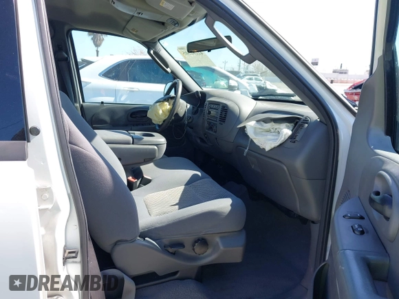 2003 Ford F-150 XLT with VIN 1FTRW07653KC82984, listed as a IAAI auction lot 42282305 with 933,470 mi miles and . Bid and sale history available at DreamBid. Image 5.
