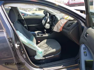 2015 Kia Optima LX with VIN KNAGM4A74F5569738, listed as a IAAI auction lot 41980622 with 161,434 mi miles. Bid and sale history available at carsss.com. Image 5.
