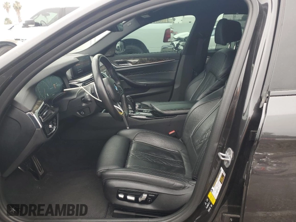 2019 BMW 5 Series M550i xDrive with VIN WBAJB9C59KB287501, listed as a Copart auction lot 59732425 with 74,345 mi miles and Salvage title. Bid and sale history available at DreamBid. Image 7.