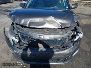 2014 Kia Optima EX with VIN 5XXGN4A78EG320367, listed as a IAAI auction lot 41858824 with 216,987 mi miles. Bid and sale history available at carsss.com. Image 6.