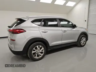 2021 Hyundai Tucson Value with VIN KM8J33A42MU392228, listed as a Copart auction lot 49471815 with 141,637 mi miles and Clean Title. Bid and sale history available at DreamBid. Image 3.