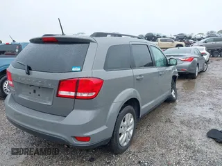 2019 Dodge Journey SE with VIN 3C4PDCBB2KT804440, listed as a IAAI auction lot 41333876 with 72,209 mi miles and . Bid and sale history available at DreamBid. Image 4.