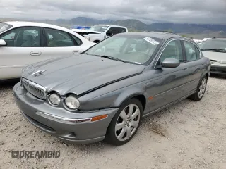 2004 Jaguar X-Type z VIN SAJEA51C74WD79420, wystawiony jako Copart lot #56749745 z przebiegiem Nie podano mil oraz Szkoda całkowita • Salvage title. Historia ofert i sprzedaży dostępna na DreamBid. Obrazek 1.