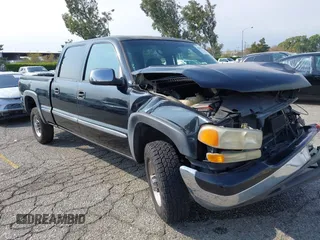2002 GMC Sierra 1500HD SLE z VIN 1GTGC13U12F134493, wystawiony jako IAAI lot #40392044 z przebiegiem 157 996 mil mil oraz . Historia ofert i sprzedaży dostępna na DreamBid. Obrazek 1.