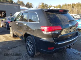 2021 Jeep Grand Cherokee Overland with VIN 1C4RJFCG3MC601150, listed as a IAAI auction lot 41421403 with 165,614 mi miles and . Bid and sale history available at DreamBid. Image 3.
