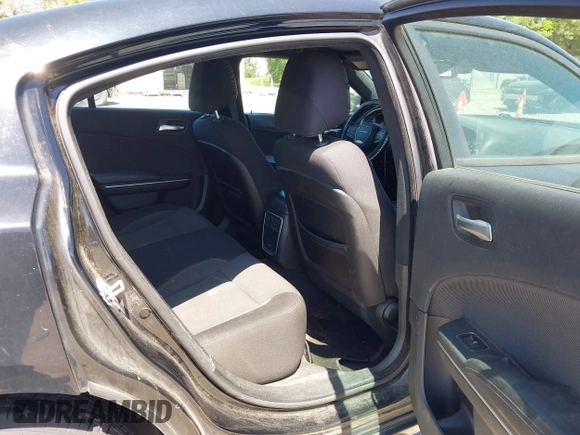 2015 Dodge Charger SE with VIN 2C3CDXBG9FH790573, listed as a IAAI auction lot 42142908 with 195,182 mi miles and . Bid and sale history available at carsss.com. Image 8.