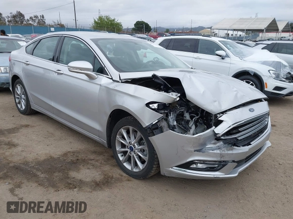 2017 Ford Fusion Energi SE with VIN 3FA6P0PU9HR354096, listed as a IAAI auction lot 42064703 with 69,601 mi miles. Bid and sale history available at carsss.com. Image 1.