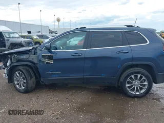 2021 Jeep Cherokee Latitude Lux with VIN 1C4PJLMX2MD107165, listed as a IAAI auction lot 42456893 with 62,625 mi miles and . Bid and sale history available at DreamBid. Image 15.