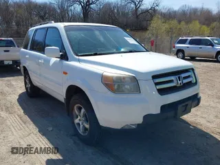 2007 Honda Pilot EX-L with VIN 5FNYF18777B002106, listed as a IAAI auction lot 42060765 with 202,276 mi miles and . Bid and sale history available at DreamBid. Image 1.
