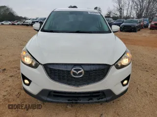 2014 Mazda CX-5 Touring with VIN JM3KE2CY1E0379158, listed as a Copart auction lot 50085935 with 90,340 mi miles and Salvage Title. Bid and sale history available at carsss.com. Image 5.