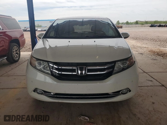 2017 Honda Odyssey Touring with VIN 5FNRL5H94HB007979, listed as a Copart auction lot 56755435 with 125,821 mi miles and Salvage title. Bid and sale history available at DreamBid. Image 5.