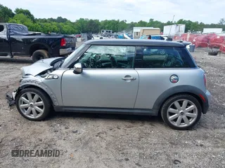 2007 MINI Hardtop S with VIN WMWMF73537TL88038, listed as a IAAI auction lot 42200252 with 70,603 mi miles and . Bid and sale history available at DreamBid. Image 15.