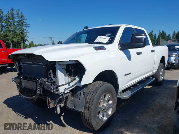 2024 Ram 2500 Big Horn with VIN 3C6UR5DJ2RG286053, listed as a IAAI auction lot 42054467 with 26,834 mi miles and . Bid and sale history available at DreamBid. Image 2.