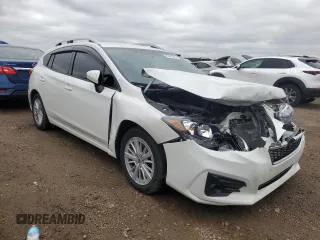 2017 Subaru Impreza Premium with VIN 4S3GTAB63H3732002, listed as a Copart auction lot 55493265 with 120,130 mi miles and Salvage title. Bid and sale history available at DreamBid. Image 4.