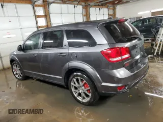 2014 Dodge Journey R/T z VIN 3C4PDCEGXET277243, wystawiony jako Copart lot #77973154 z przebiegiem 143 766 mil mil oraz Szkoda całkowita • Salvage title. Historia ofert i sprzedaży dostępna na DreamBid. Obrazek 2.
