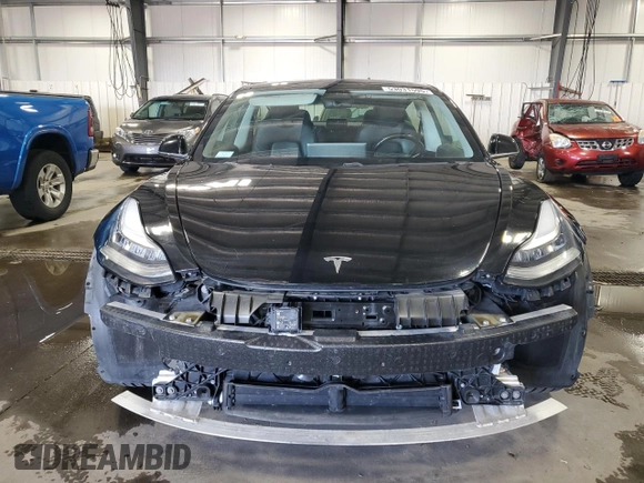 2019 Tesla Model 3 Mid Range z VIN 5YJ3E1EA4KF310792, wystawiony jako Copart lot #53031595 z przebiegiem 99 799 mil mil oraz Szkody całkowita. Historia ofert i sprzedaży dostępna na DreamBid. Obrazek 5.