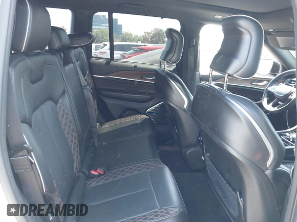 2023 Jeep Grand Cherokee Summit Reserve with VIN 1C4RJYE68P8787968, listed as a IAAI auction lot 42338911 with 28,652 mi miles and . Bid and sale history available at DreamBid. Image 8.