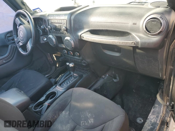 2017 Jeep Wrangler Willys Wheeler with VIN 1C4AJWAG9HL673766, listed as a Copart auction lot 43132555 with 129,422 mi miles and Salvage Title. Bid and sale history available at DreamBid. Image 8.