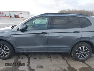 2021 Volkswagen Tiguan S with VIN 3VV1B7AX8MM016874, listed as a IAAI auction lot 41633090 with 76,857 mi miles and . Bid and sale history available at DreamBid. Image 14.