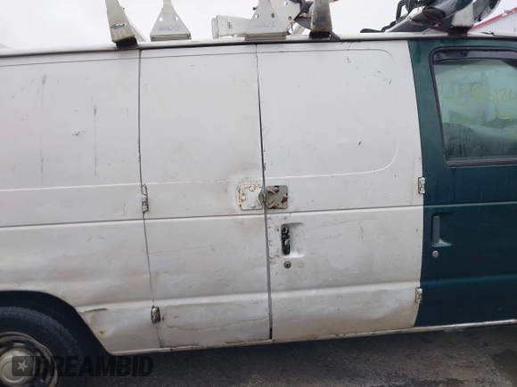 2004 Ford Econoline Cargo with VIN 1FTRE14W44HB53758, listed as a IAAI auction lot 40926124 with 139,104 mi miles. Bid and sale history available at carsss.com. Image 12.