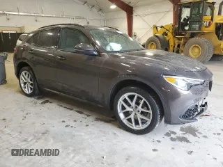 2019 Alfa Romeo Stelvio Ti z VIN ZASPAKBN3K7C29998, wystawiony jako Copart lot #54129185 z przebiegiem Nie podano mil oraz Szkoda całkowita • Salvage title. Historia ofert i sprzedaży dostępna na DreamBid. Obrazek 4.