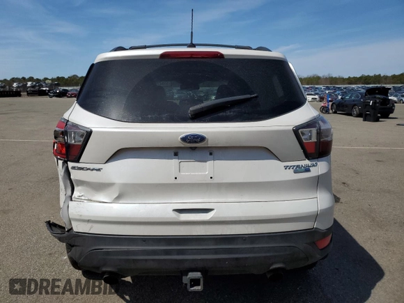 2017 Ford Escape Titanium with VIN 1FMCU9J90HUB19038, listed as a Copart auction lot 53947575 with 94,462 mi miles and Salvage Title. Bid and sale history available at carsss.com. Image 6.
