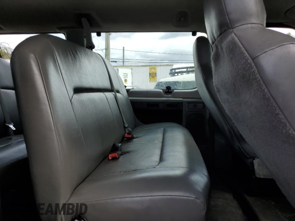 2011 Ford Econoline Passenger XL with VIN 1FMNE1BW2BDA00300, listed as a Copart auction lot 74028854 with 179,955 mi miles and Salvage Title. Bid and sale history available at DreamBid. Image 11.