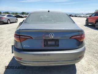 2019 Volkswagen Jetta S z VIN 3VWC57BU5KM061736, wystawiony jako Copart lot #55365334 z przebiegiem Nie podano mil oraz Szkoda całkowita • Salvage title. Historia ofert i sprzedaży dostępna na DreamBid. Obrazek 6.