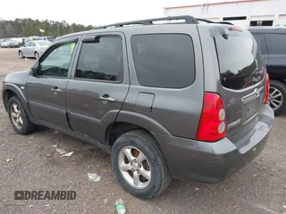 2006 Mazda Tribute S with VIN 4F2YZ04196KM12510, listed as a IAAI auction lot 41382627 with 242,650 mi miles and . Bid and sale history available at DreamBid. Image 3.