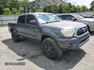 2013 Toyota Tacoma with VIN 3TMLU4EN1DM129865, listed as a Copart auction lot 60783185 with 218,457 mi miles and Clean title. Bid and sale history available at DreamBid. Image 4.