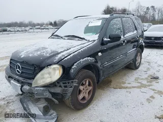 2001 Mercedes-Benz M-Class with VIN 4JGAB54E21A252034, listed as a IAAI auction lot 41573177 with 168,672 mi miles. Bid and sale history available at carsss.com. Image 2.