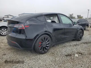 2024 Tesla Model Y Performance with VIN 7SAYGDEF1RF028278, listed as a Copart auction lot 48900935 with 41,606 mi miles and Salvage Title. Bid and sale history available at DreamBid. Image 3.