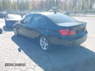 2013 BMW 3 Series 328i xDrive with VIN WBA3B5G53DNS04643, listed as a IAAI auction lot 42143365 with 107,448 mi miles. Bid and sale history available at carsss.com. Image 3.