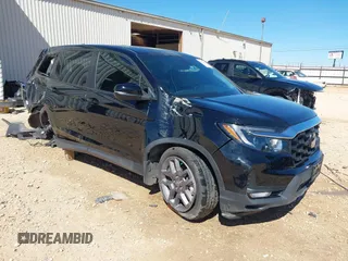 2023 Honda Passport EX-L with VIN 5FNYF8H5XPB013172, listed as a IAAI auction lot 41680601 with 29,016 mi miles and . Bid and sale history available at carsss.com. Image 1.