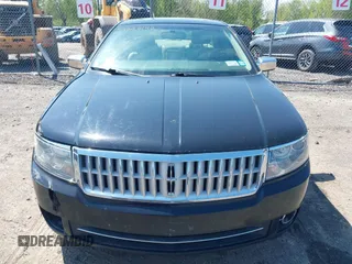 2007 Lincoln MKZ z VIN 3LNHM26TX7R636306, wystawiony jako IAAI lot #42220142 z przebiegiem 152 728 mil mil oraz . Historia ofert i sprzedaży dostępna na DreamBid. Obrazek 13.