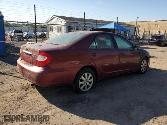 2004 Toyota Camry LE z VIN 4T1BE30K44U299631, wystawiony jako Copart lot #53949745 z przebiegiem 247 444 mil mil oraz Szkoda całkowita • Salvage title. Historia ofert i sprzedaży dostępna na DreamBid. Obrazek 3.