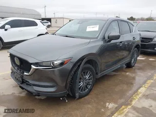 2021 Mazda CX-5 Touring with VIN JM3KFBCM0M0342210, listed as a IAAI auction lot 41236013 with 96,012 mi miles. Bid and sale history available at carsss.com. Image 20.