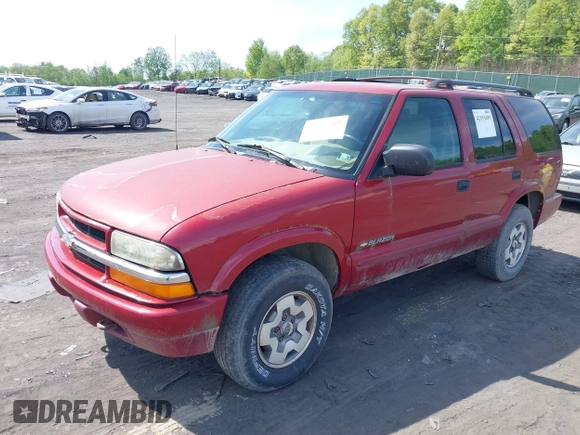 2002 Chevrolet Blazer LS z VIN 1GNDT13WX2K237284, wystawiony jako IAAI lot #42193499 z przebiegiem 137 258 mil mil oraz . Historia ofert i sprzedaży dostępna na DreamBid. Obrazek 2.