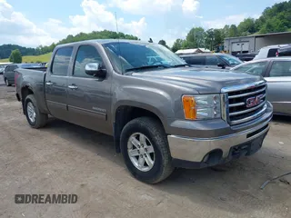 2012 GMC Sierra 1500 SLT with VIN 3GTP2WE71CG189114, listed as a IAAI auction lot 42661045 with 194,328 mi miles and . Bid and sale history available at DreamBid. Image 1.