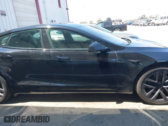 2021 Tesla Model S Long Range z VIN 5YJSA1E54MF429360, wystawiony jako IAAI lot #42662440 z przebiegiem 36 395 mil mil oraz . Historia ofert i sprzedaży dostępna na DreamBid. Obrazek 13.
