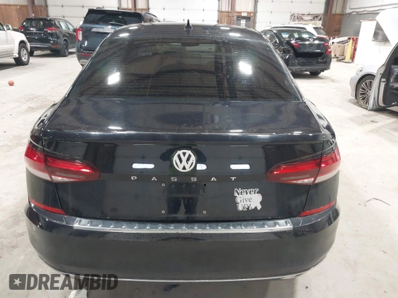 2021 Volkswagen Passat SE z VIN 1VWSA7A39MC001401, wystawiony jako IAAI lot #42019308 z przebiegiem 82 203 mil mil oraz . Historia ofert i sprzedaży dostępna na DreamBid. Obrazek 16.